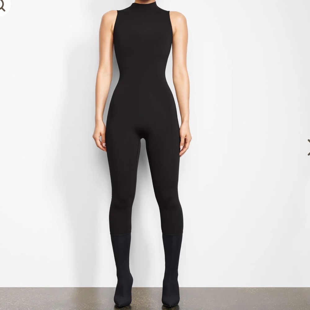 ALL-IN-ONE MOCK NECK SLEEVELESS ONESIE